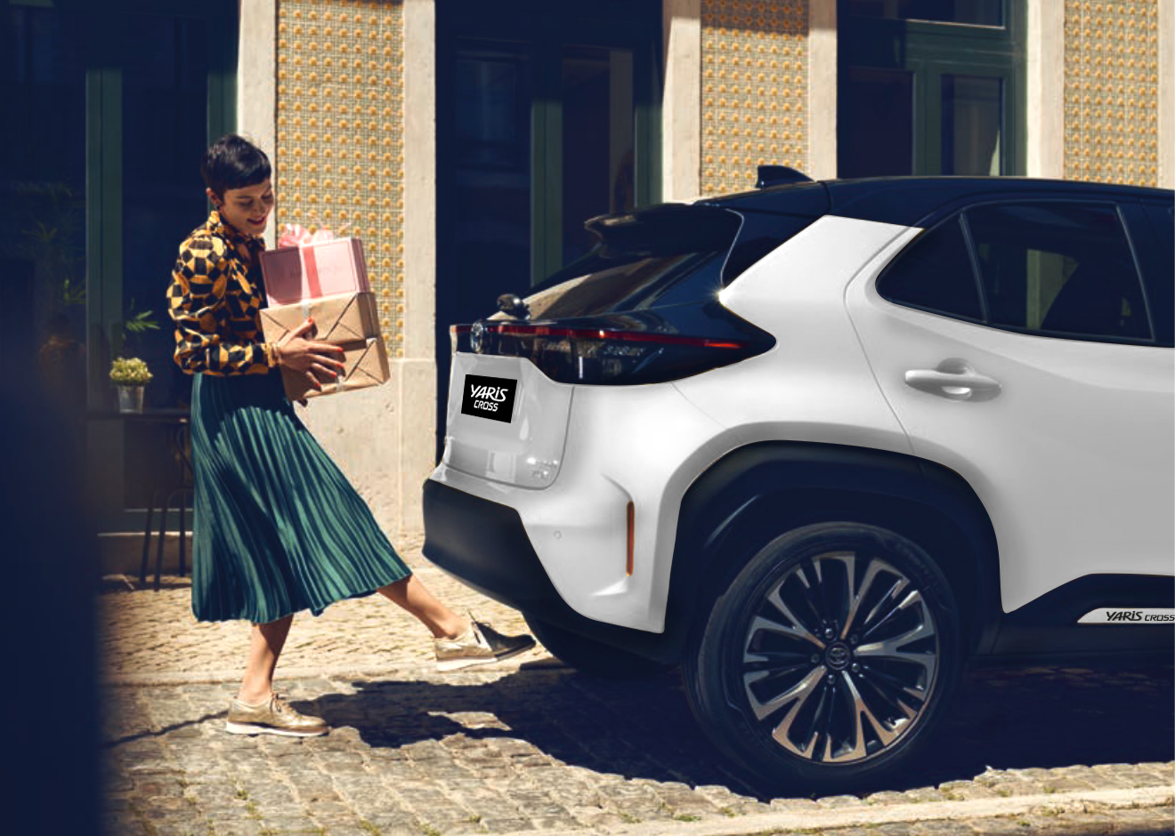 kick open yaris cross